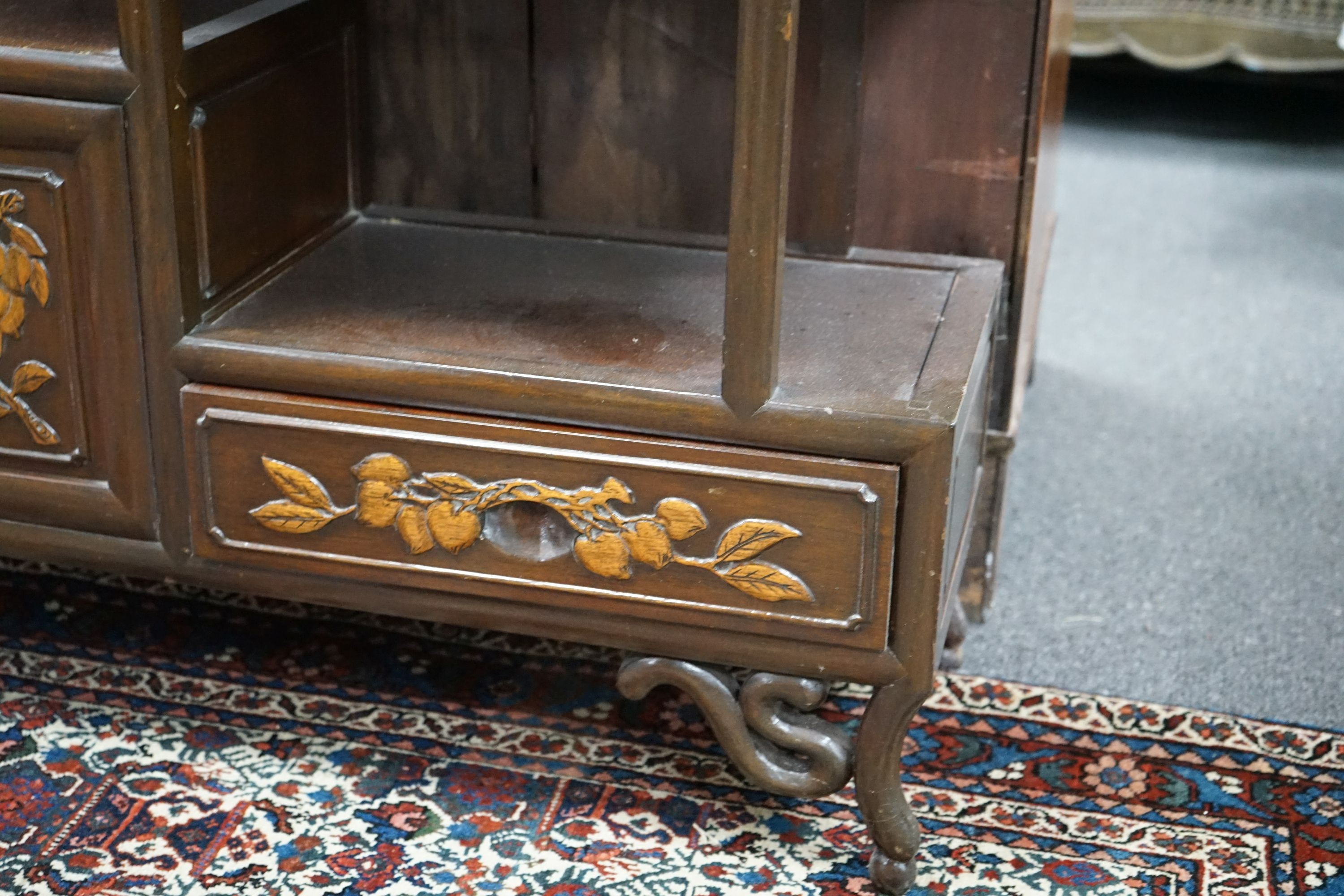 A Chinese elm tiered side cabinet, width 81cm, depth 26cm, height 91cm